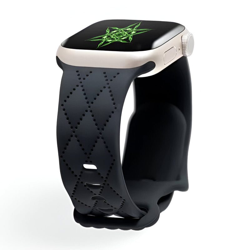 Bracelet Apple Watch noir en silicone avec motif losanges texturé, boucle à ardillon.