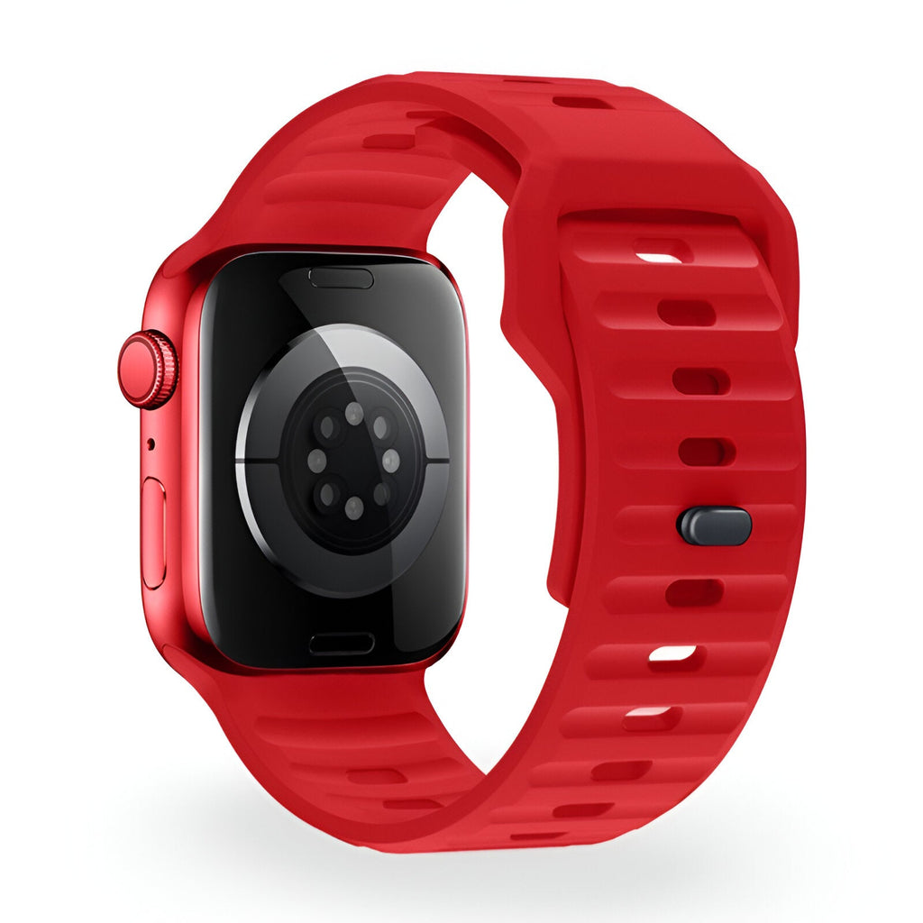 Bracelet Apple Watch silicone rouge vif modèle Kylix, fermeture à boucle, design ajouré et ajustable.