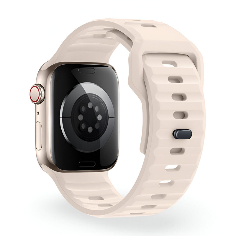 Bracelet Apple Watch en silicone beige clair avec fermeture à boucle ajustable, design unisexe.