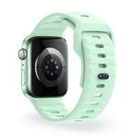Bracelet Apple Watch en silicone vert menthe taille 43 à 49 mm design sport ajustable.