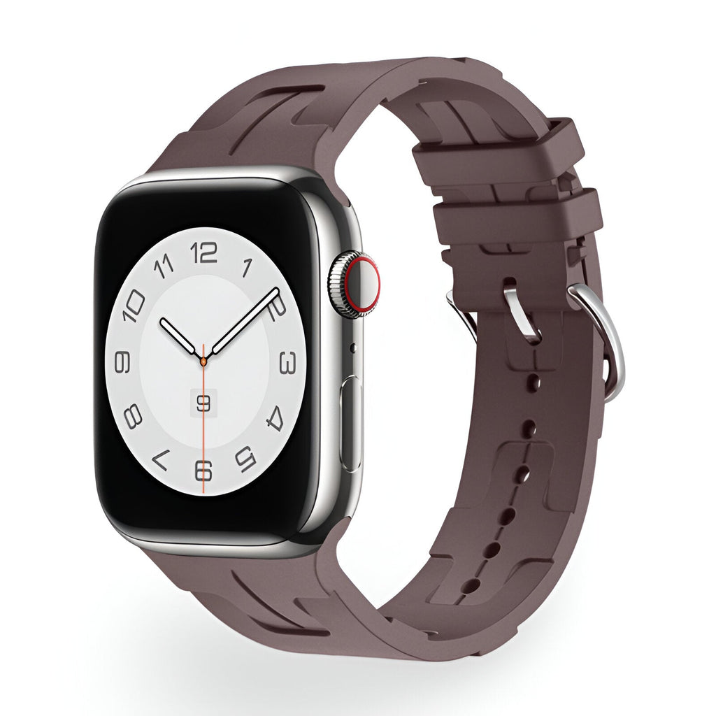 Bracelet Apple Watch en silicone taupe, style mixte avec fermoir métallique ajustable.