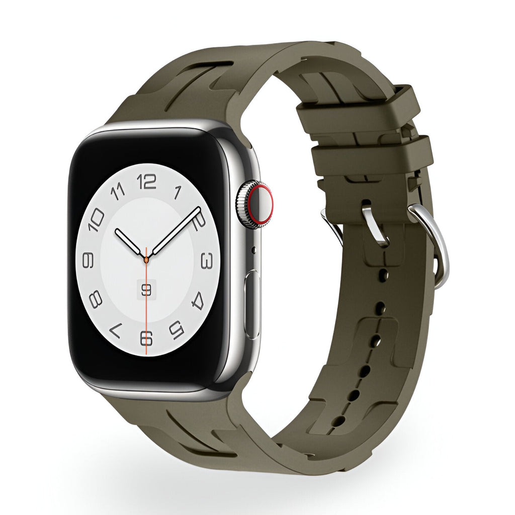 Bracelet Apple Watch en silicone kaki, design sport avec boucle classique en métal argenté.