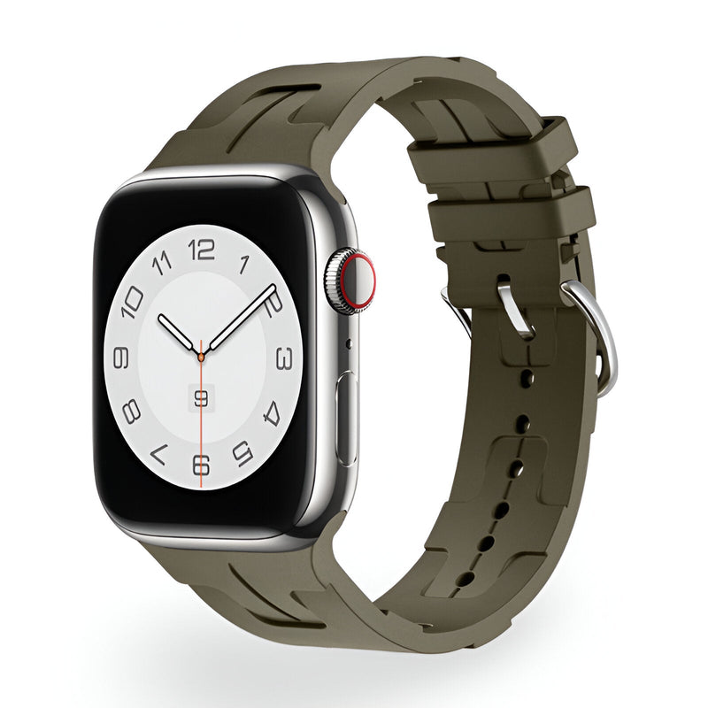 Bracelet Apple Watch en silicone kaki, design sport avec boucle classique en métal argenté.