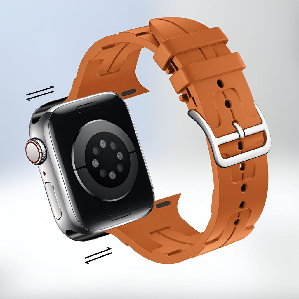 Bracelet Apple Watch en silicone orange avec boucle argentée pour modèles 38 à 42 mm.