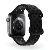 Bracelet Apple Watch silicone noir mixte avec motif tressé et perforations ajustables.