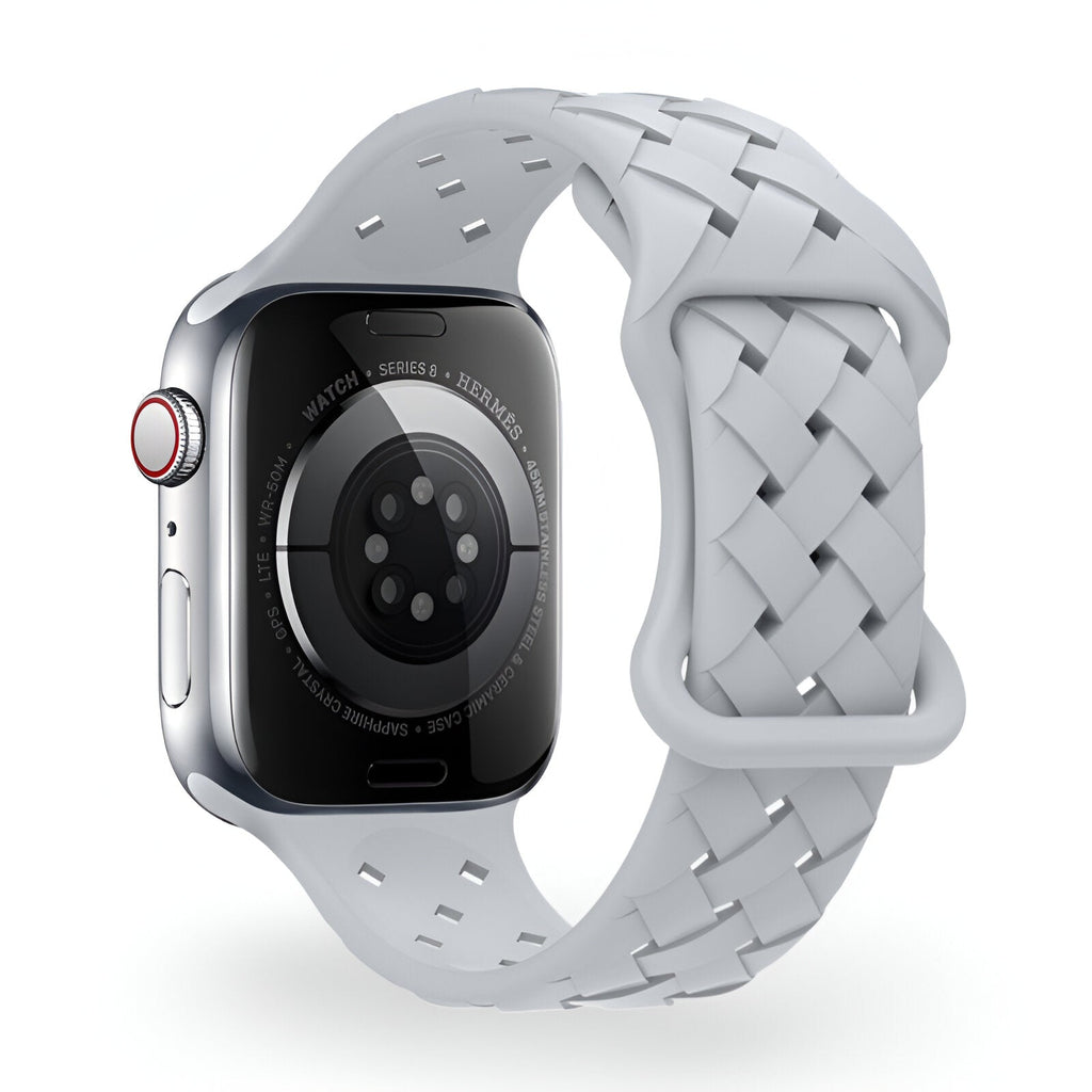 Bracelet silicone blanc tressé pour Apple Watch, fermeture ajustable.