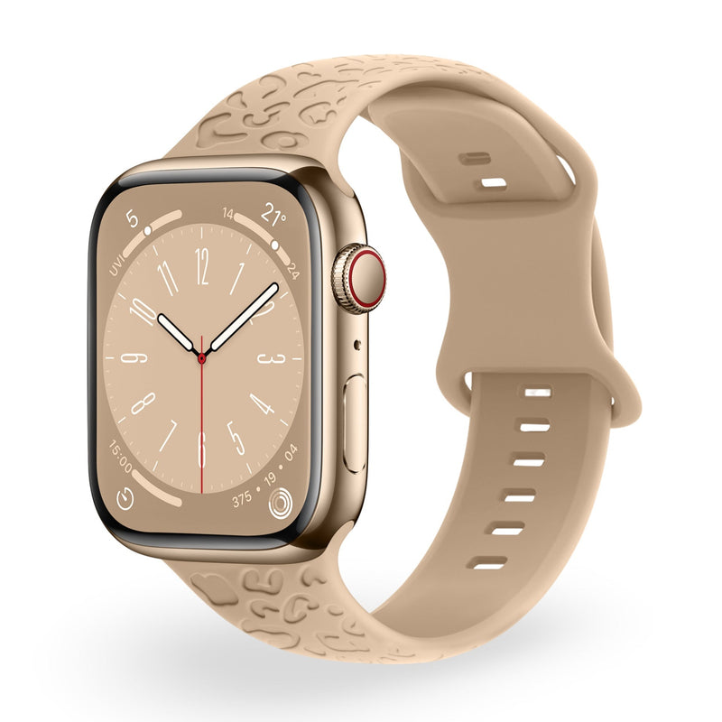 Bracelet silicone beige clair pour Apple Watch avec texture embossée élégante.
