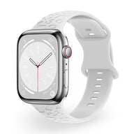 Bracelet Apple Watch en silicone blanc avec motifs texturés, taille ajustable, modèle mixte Soria.