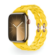 Bracelet Apple Watch en silicone jaune vif avec maillons entrelacés pour un style moderne et confortable.