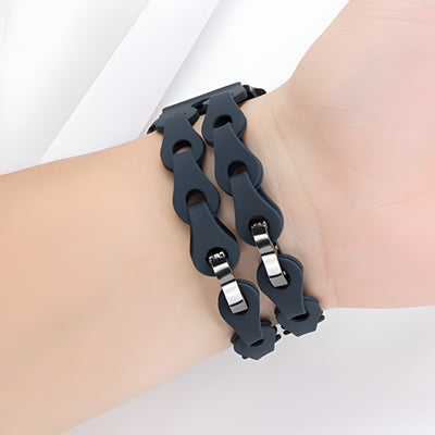 Bracelet Apple Watch en silicone noir mixte modèle Vexa avec maillons larges et fermoir métallique double.