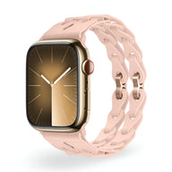 Bracelet Apple Watch en silicone rose pâle avec maillons style chaîne pour modèles 38 à 42 mm.