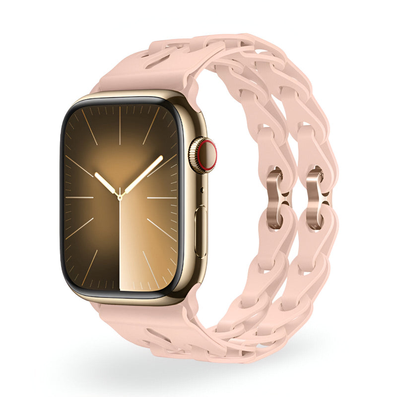 Bracelet Apple Watch en silicone rose pâle avec maillons style chaîne pour modèles 38 à 42 mm.