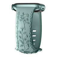 Bracelet Apple Watch en silicone vert d'eau avec motif floral en relief, design mixte modèle Nexus.