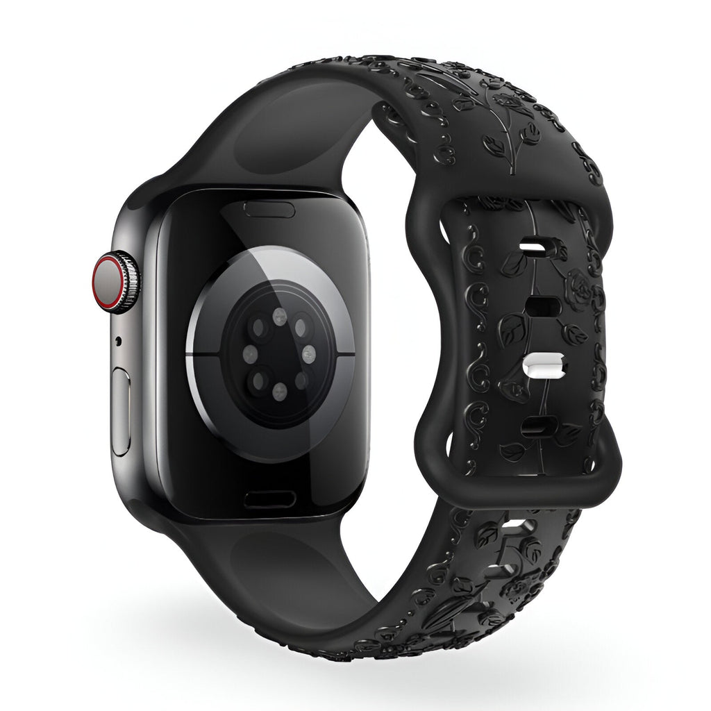 Bracelet Apple Watch en silicone noir avec motif floral texturé et boucle ajustable.