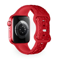 Bracelet Apple Watch rouge en silicone avec motif floral en relief, style mixte, modèle Nexus.