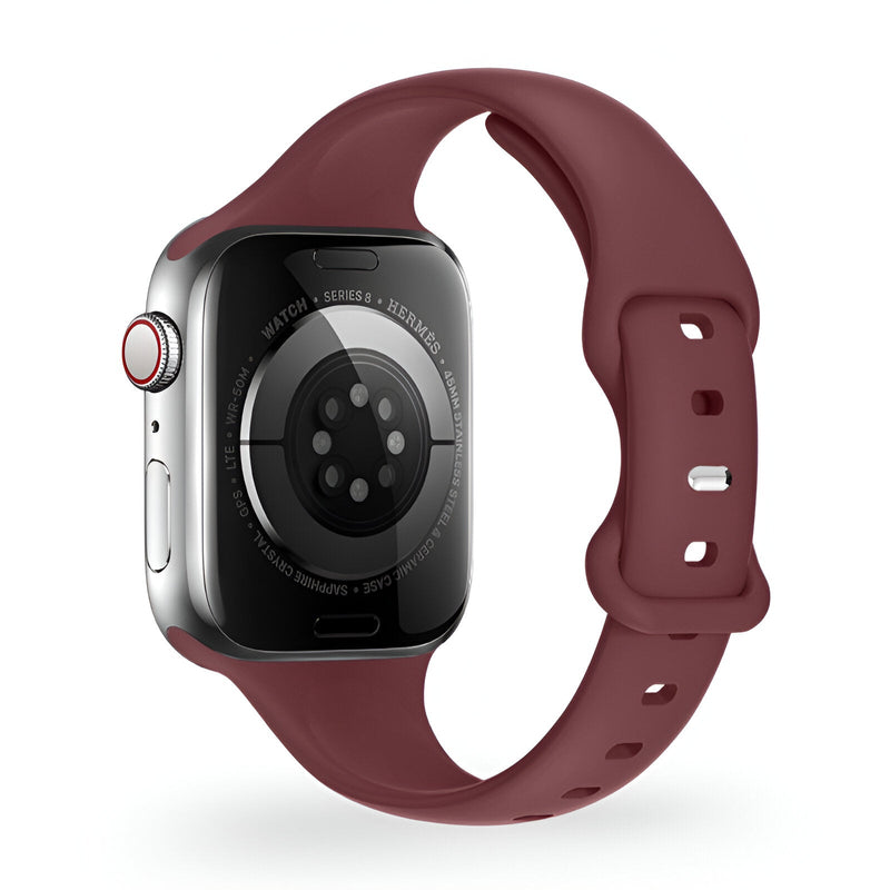 Bracelet en silicone bordeaux pour Apple Watch femme, modèle Kairo, fermeture ajustable.