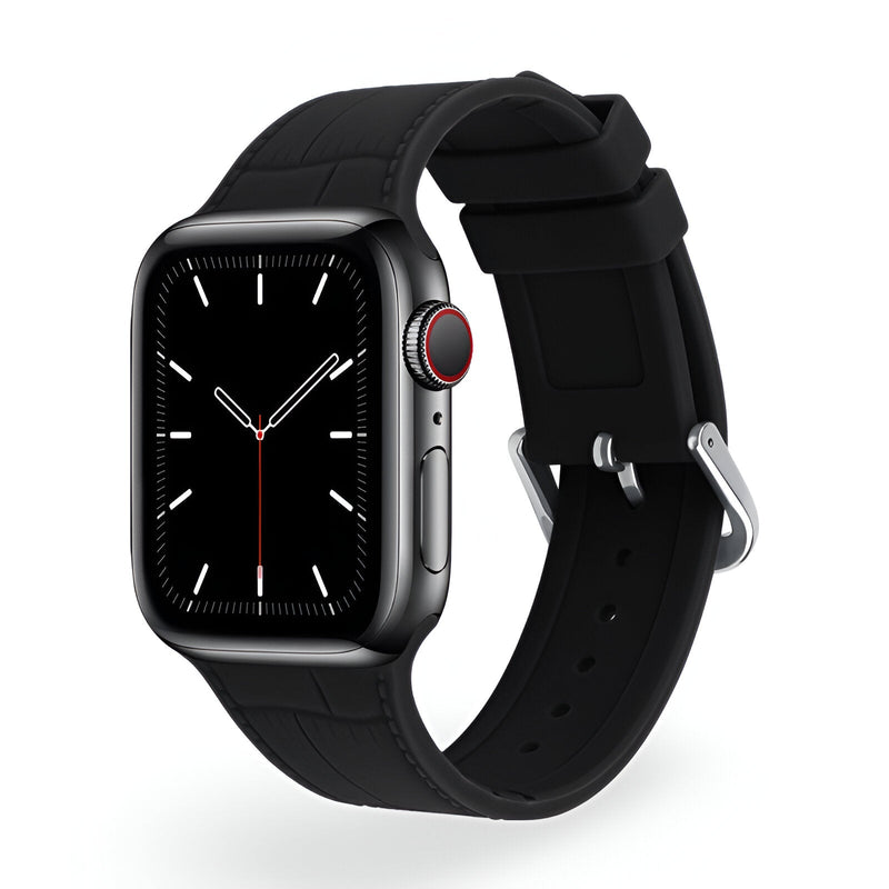 Bracelet Apple Watch en silicone noir, boucle argentée, design lisse et ajustable, modèle Zora pour femme.