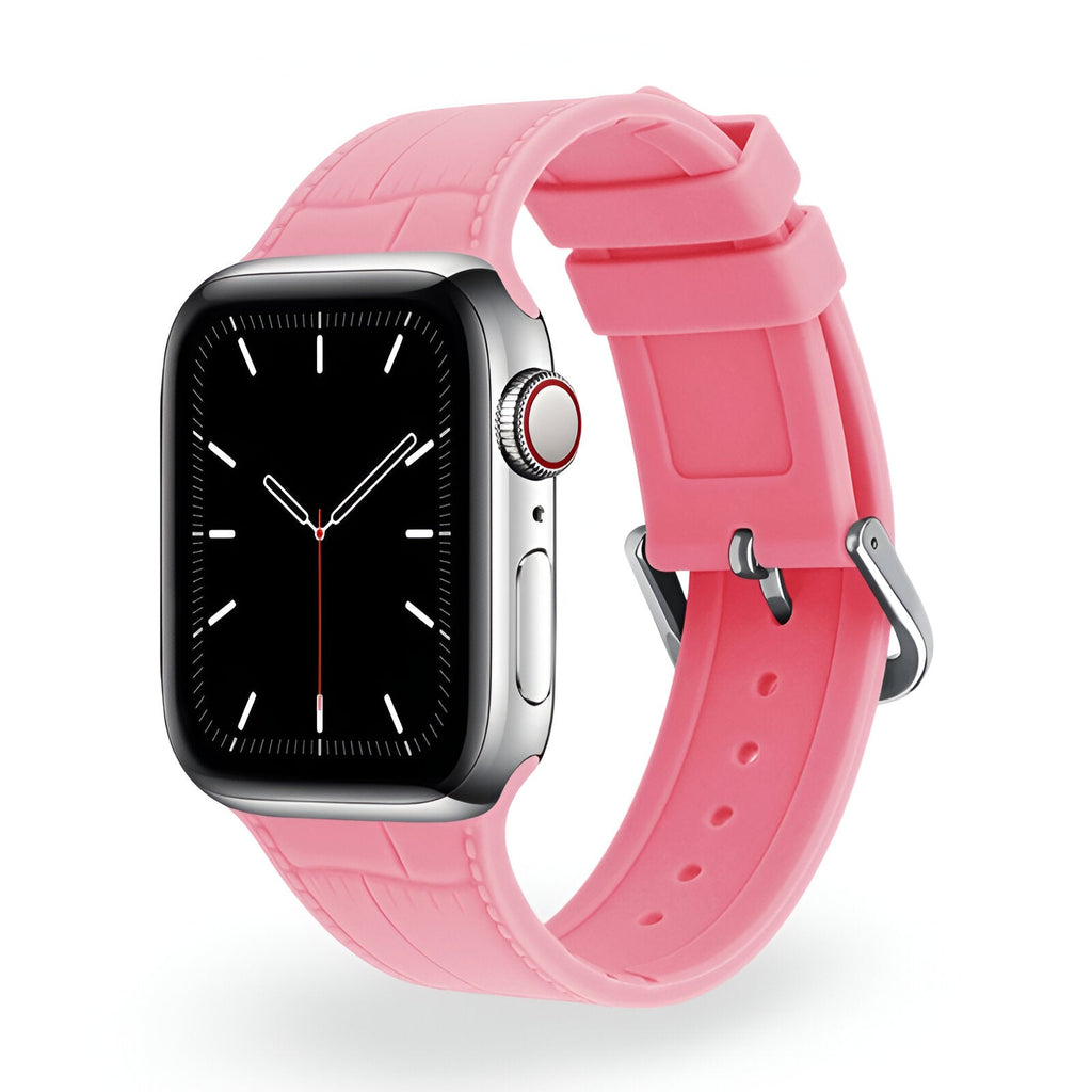 Bracelet Apple Watch en silicone rose modèle Zora avec boucle argentée, style croco élégant.