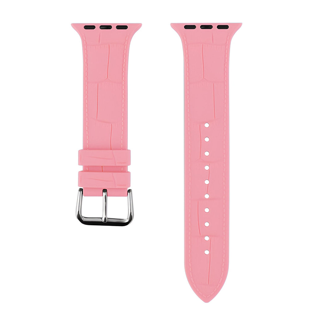 Bracelet Apple Watch en silicone rose pour femme avec boucle métallique argentée.