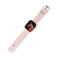 Bracelet pour Apple Watch en silicone gris clair style brique avec boucle métallique argentée.