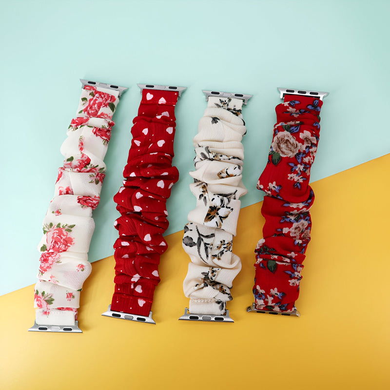 Bracelets Apple Watch en tissu élastique floral, couleurs blanc, rouge et beige, motifs variés.