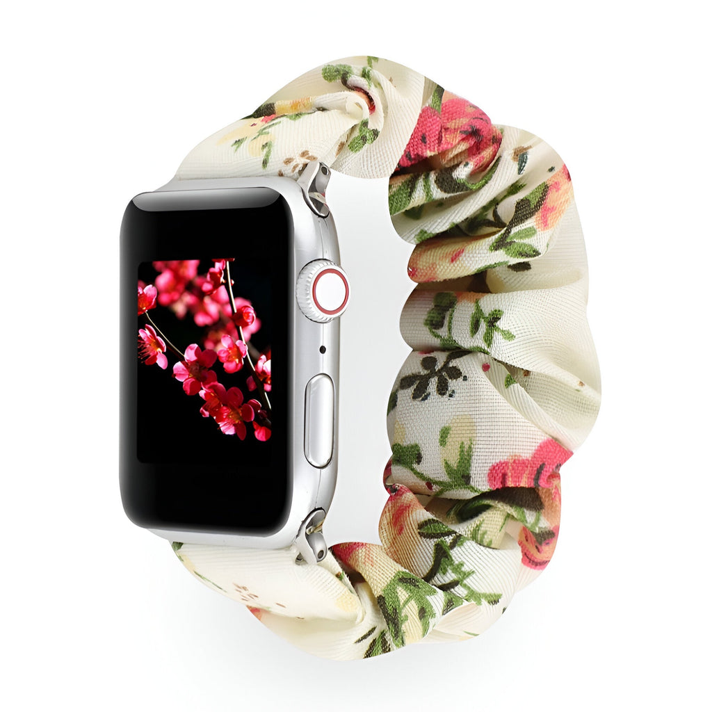 Bracelet Apple Watch en tissu élastique blanc à motif floral rose et vert, style Leyra, pour femme.