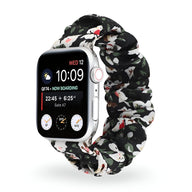 Bracelet élastique floral noir pour Apple Watch avec fleurs blanches et rouges, style Leyra.