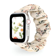 Bracelet Apple Watch élastique floral beige avec petites fleurs rouges et vertes, style Leyra.