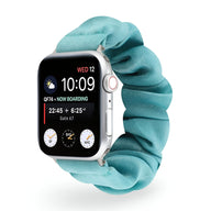 Bracelet élastique turquoise pour Apple Watch, tissu plissé doux, taille ajustable femme.