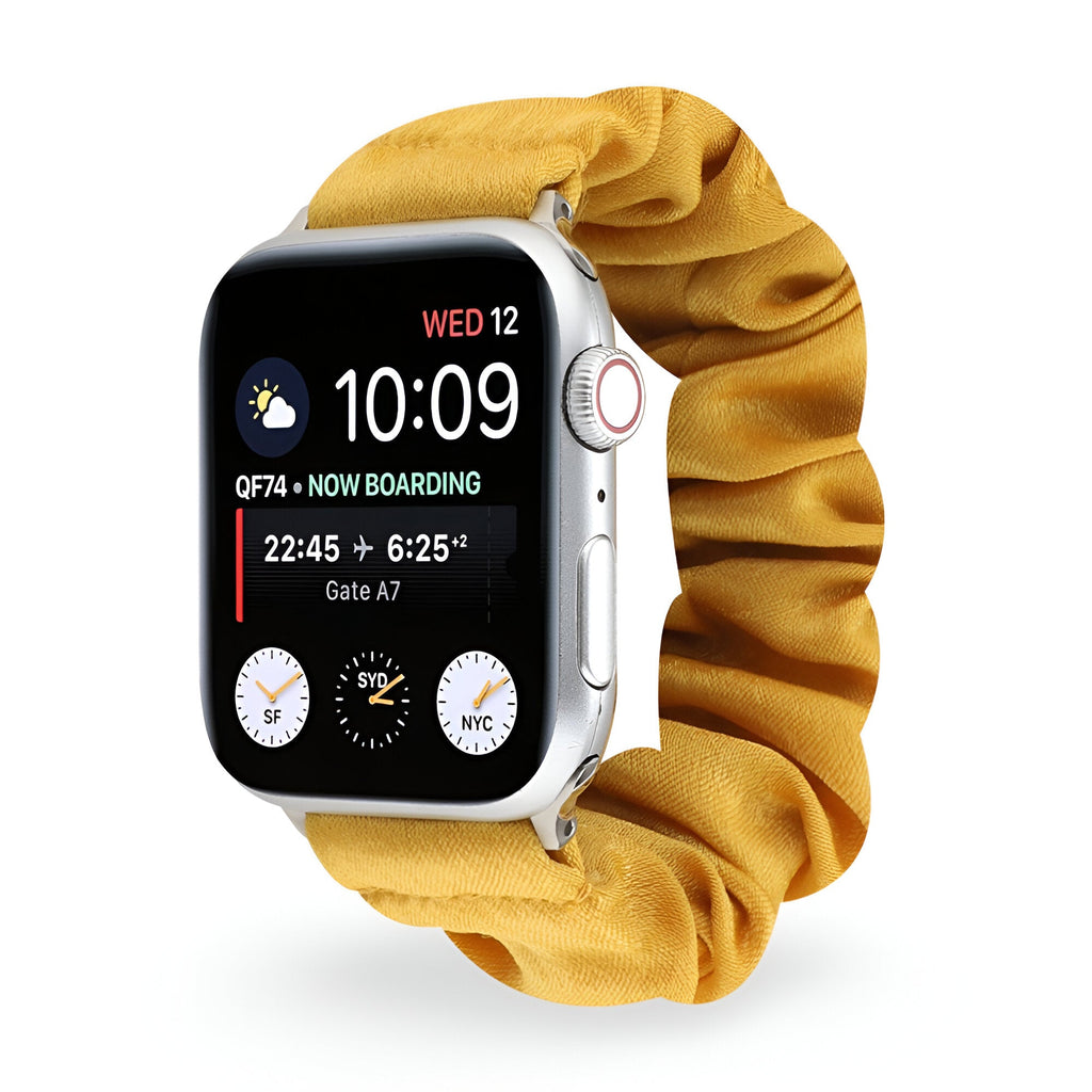 Bracelet élastique jaune en tissu pour Apple Watch, style scrunchie doux et féminin.