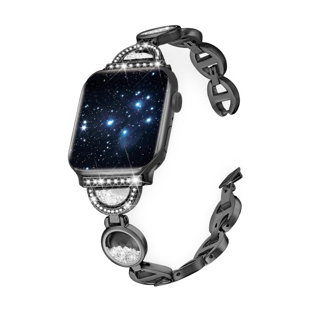 Bracelet Apple Watch femme noir avec incrustations de sable blanc et maillons élégants en métal.