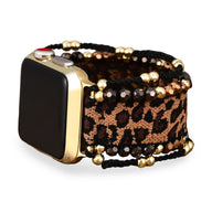 Bracelet Apple Watch femme motif léopard marron avec perles noires et dorées, style tressé.