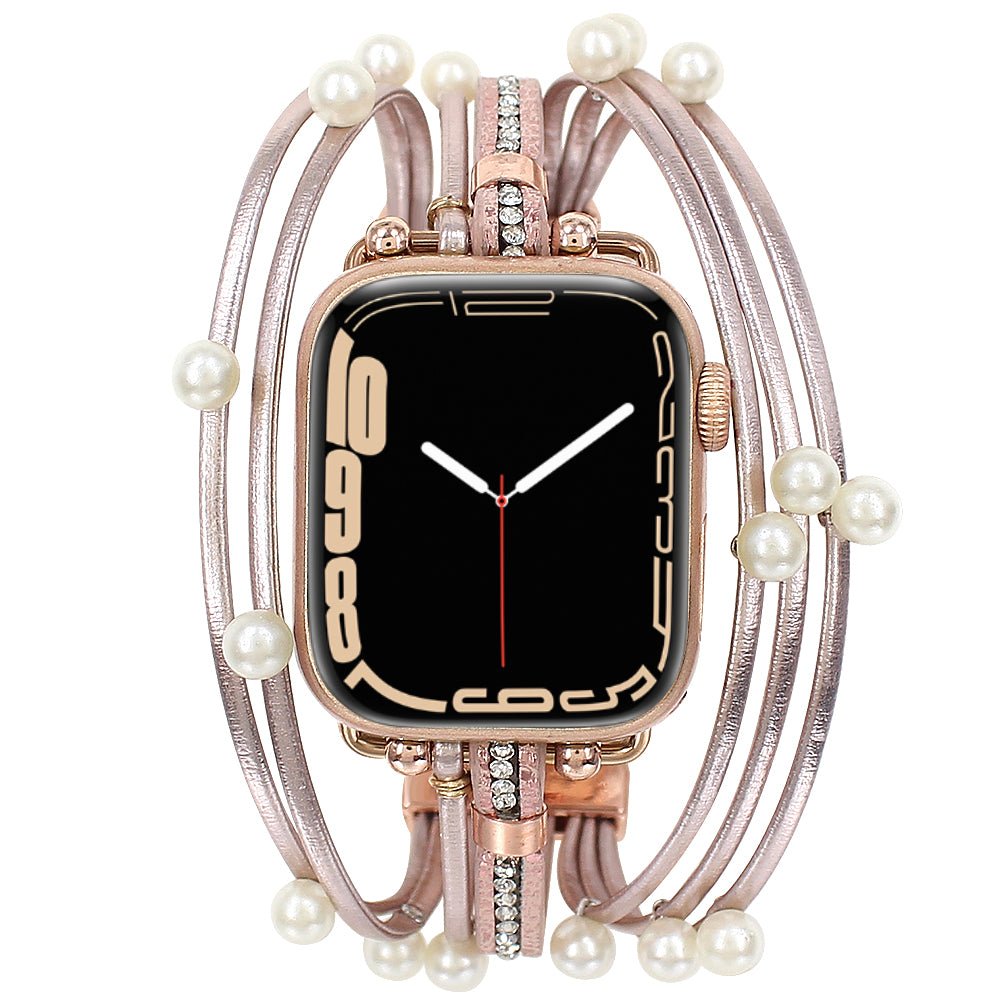 Bracelet multi-rangs rose pâle pour Apple Watch orné de perles blanches et strass scintillants.