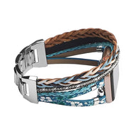 Bracelet multi-rangs bleu et marron pour Apple Watch avec tresses, perles et motif floral élégant.