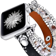 Bracelet multi-rangs perlé léopard noir et blanc avec fermoir pour Apple Watch argentée.