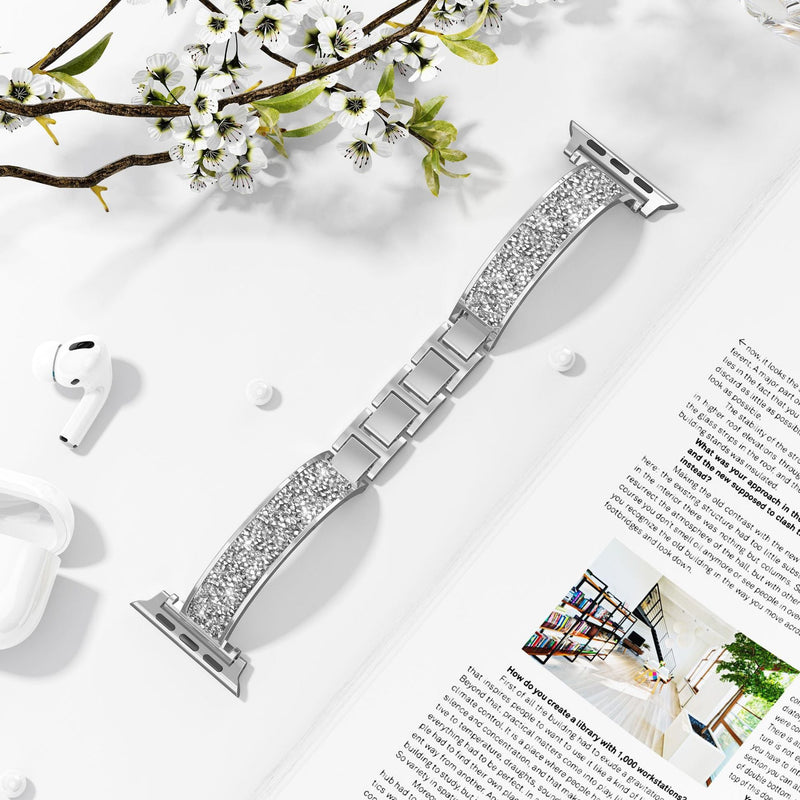 Bracelet Apple Watch argenté pailleté pour femme, maillons larges en métal brillant.