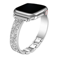 Bracelet pailleté argenté pour Apple Watch, style élégant et féminin, finition brillante.
