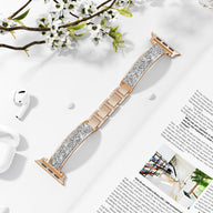 Bracelet Apple Watch or rosé pailleté pour femme, modèle Douwa, maillons métalliques élégants.