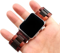 Bracelet pour Apple Watch en bois noir et rose aux maillons larges et finition mate, design masculin élégant.