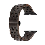Bracelet pour Apple Watch en bois d'ébène noir avec maillons larges et fermoir intégré.