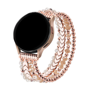 Bracelet de montre pour Samsung Galaxy Watch en métal rose doré avec cristaux scintillants et perles blanches.