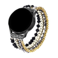 Bracelet pour montre Samsung Galaxy avec cristaux noirs, argentés et dorés, style triple rangée scintillant.