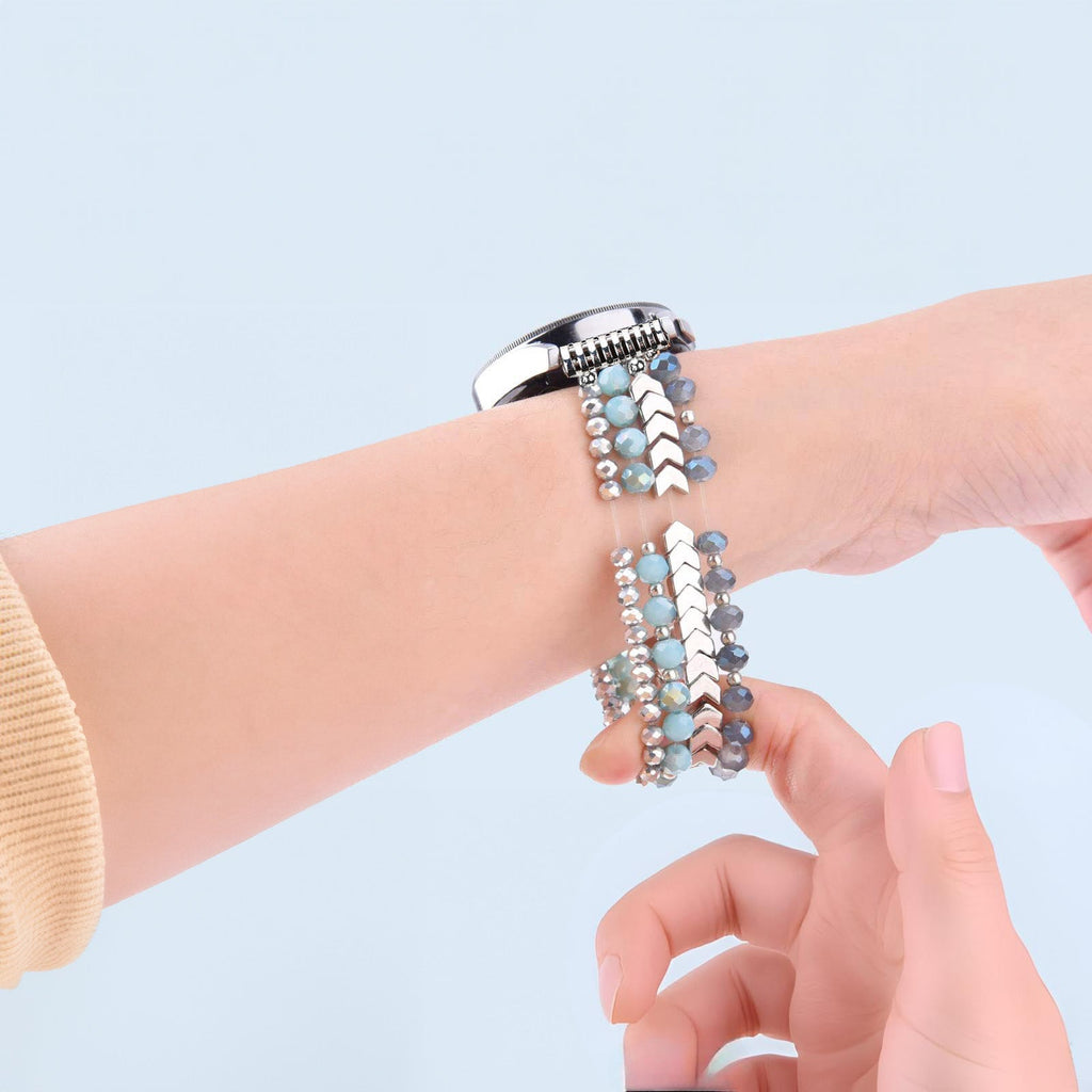 Bracelet pour montre Samsung Galaxy en cristaux bleus et argentés, style élégant et scintillant.