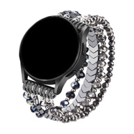 Bracelet de montre connecté gris en cristaux scintillants à trois rangs pour Samsung Galaxy Watch.