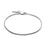 Bracelet homme en acier inoxydable argenté, chaînette fine avec fermoir lobster et pendentif discret.