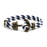 Bracelet double cordon bleu et blanc tressé avec motif ancre antique en métal bronze.