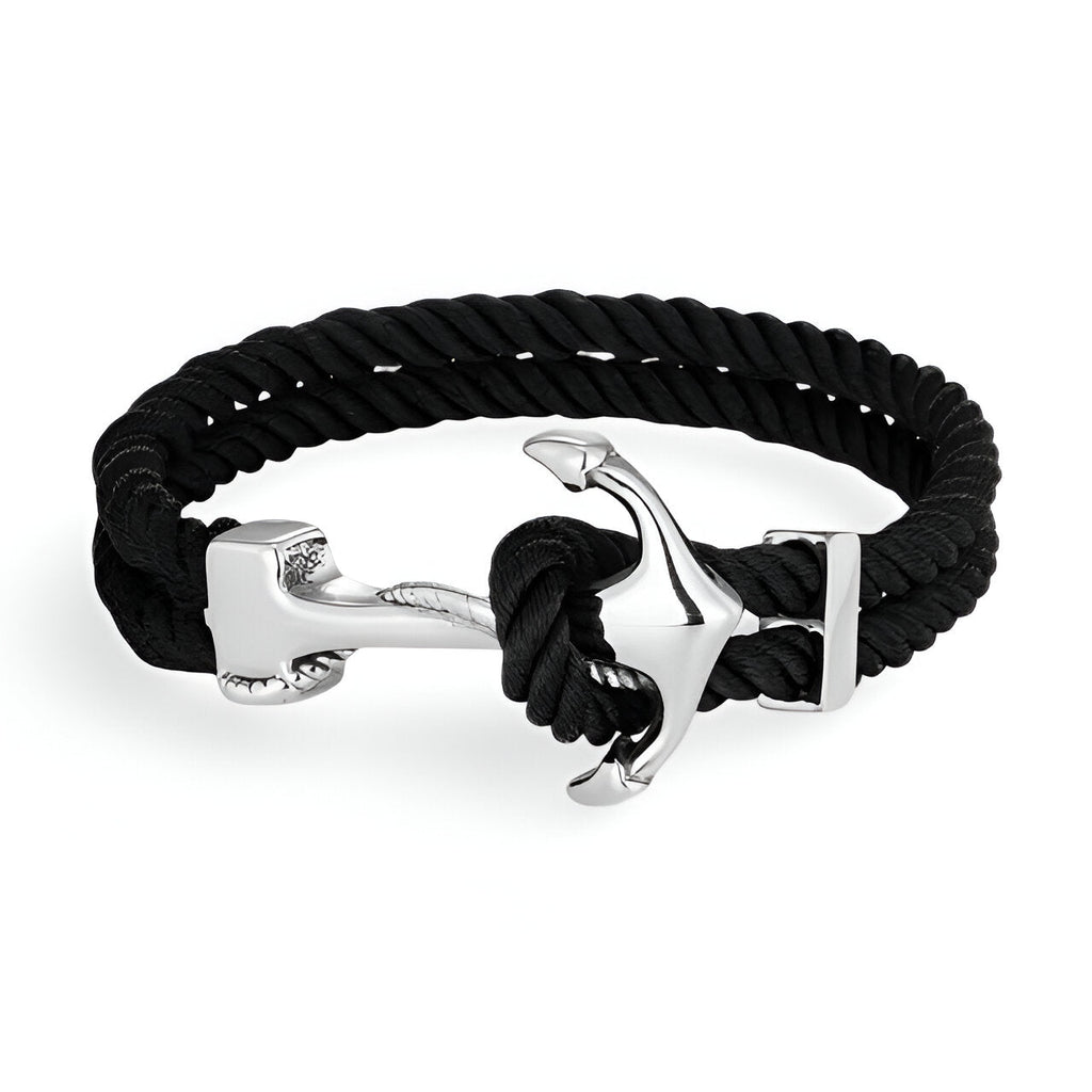 Bracelet double cordon noir avec motif ancre argentée en acier inoxydable.