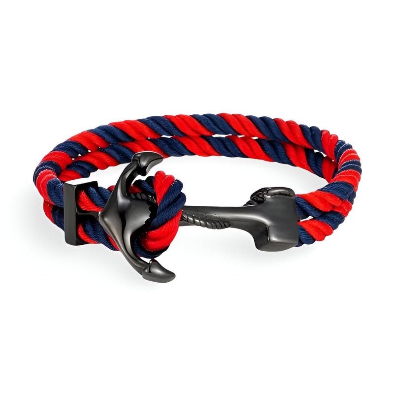Bracelet double cordon rouge et bleu avec motif ancre noire en métal brillant.