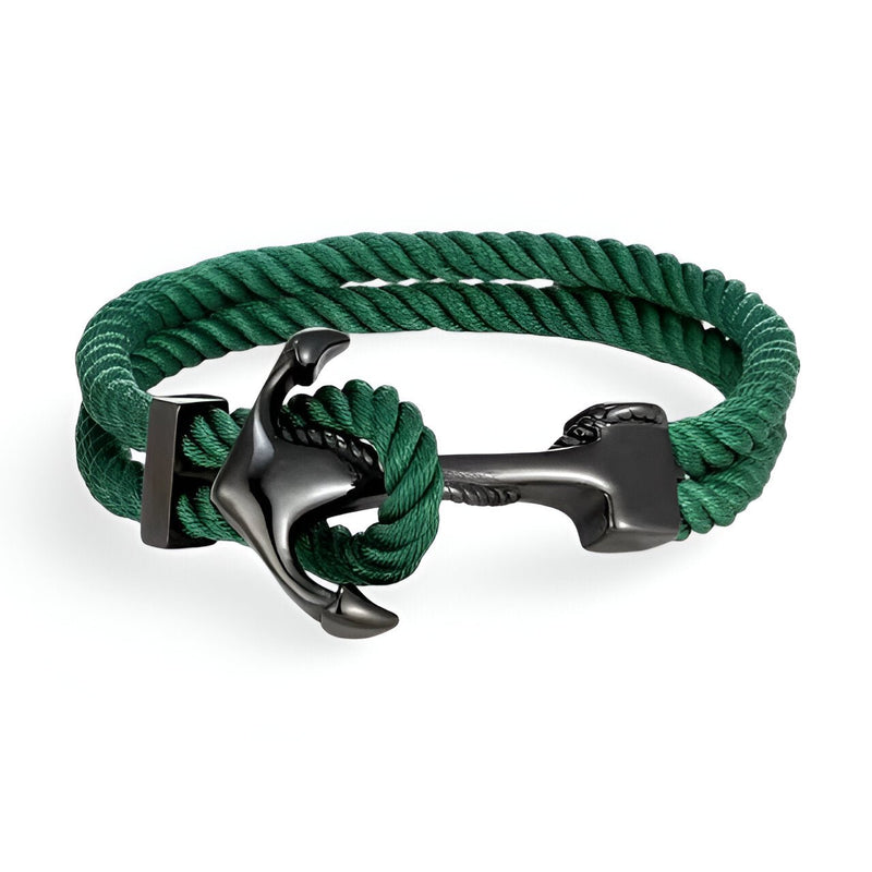 Bracelet double cordon vert avec motif ancre noire en métal brillant, style marin.