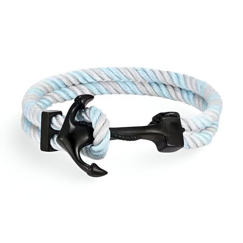 Bracelet double cordon bleu et blanc avec motif ancre noire en métal.